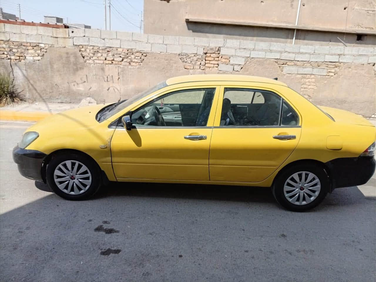 ‏سلام عليكم لانسر موديل 10 السيارة جاهزة من كل شيء مكينة 2000 تبريد مكينة تخم تاير صدر كله جديد والسعر 57 مكان السيارة ديالى أرقام سنوية هزة كله جديد ضرر جامرلغ بدون من داخل بدون نقص السيارة جاهزة من كل شيء مكان السيارة ديالى(***********
