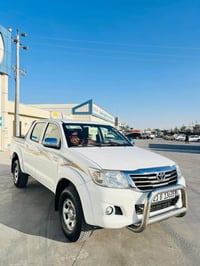 هايلوكس ٢٠١٤ • ٢٠٠٠٠٠ كم • كفرات جديدة
