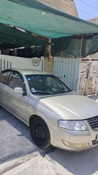 نيسان سني موديل 2007 رقم بغداد دولي بأسمي  سنويتهه لل 2031  گير + محرك...