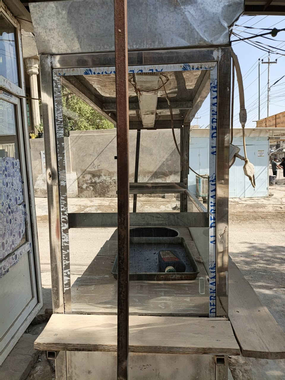 باترينة سن ستيل جديدة السعر خاص موجود  رقم ***********
