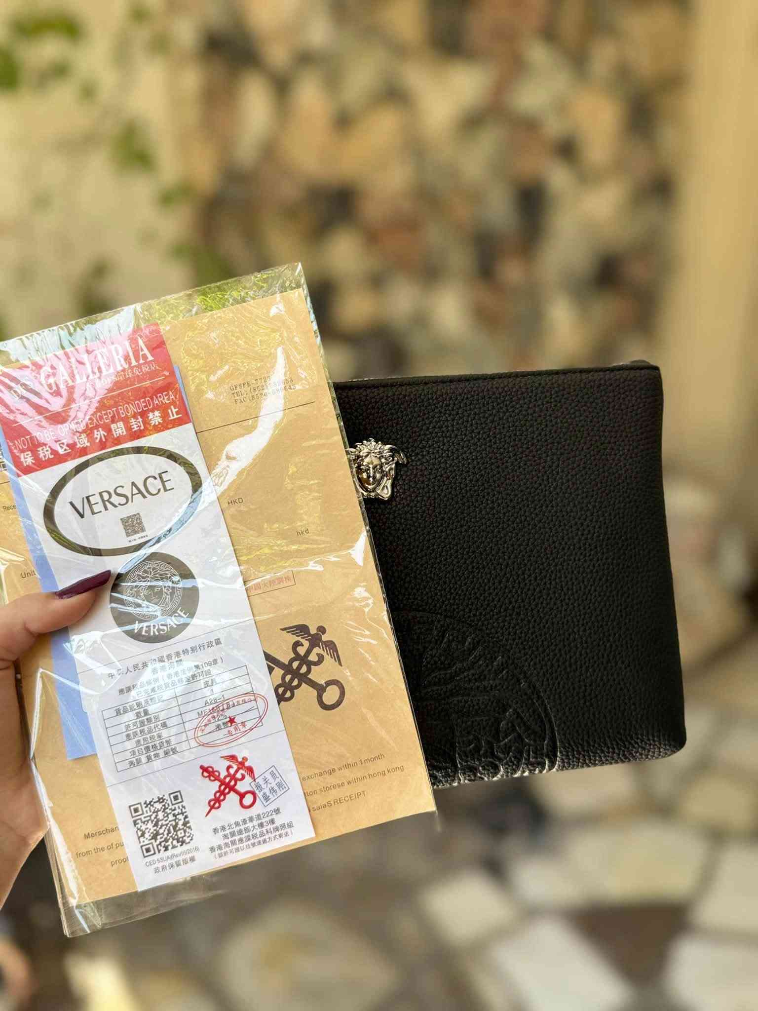 حقيبة • فيرساتشي