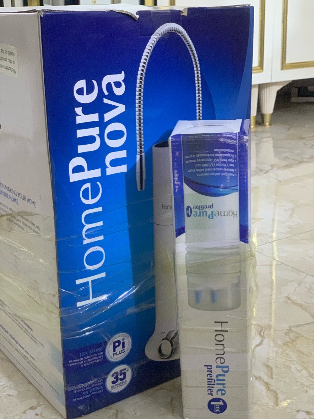 للبيع جهاز تنقية المياه HomePure Nova من شركة كيونت (QNET) العالمية، جديد بالكرتونة وغير مستعمل نهائياً.
 الحالة: جديد تماماً (أصلية بالعلبة والملحقات كاملة).
 الملحقات الإضافية: يجي وياه الفلتر الأولي (HomePure Prefilter 1mc) لحماية الجهاز وتنقية الأتربة والرمال.
 المميزات:
 تقنية ترشيح 9 في 1 مع غشاء 35 Ultratech لإزالة 99.9999% من البكتيريا والفيروسات.
 يعمل بدون كهرباء وبدون هدر للمياه.
 معزز بتقنية Pi-Water لماء صحي ونقي وغني بمضادات الأكسدة.
 يزيل الكلور، الروائح، والشوائب بالكامل.
السعر المطلوب: 850,000 دينار عراقي (قابل للتفاوض البسيط للجادين).
