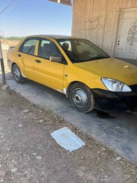 لانسر • ٢٠١٠ • للبيع