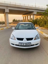 لانسر GLX • ٢٠٠٩ • فول مواصفات