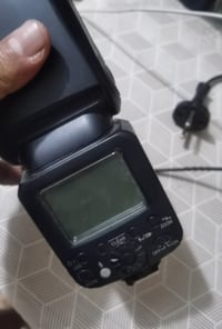 فلاش كانون بدون شاحن ترايبود  L870 شغال يعني خلص شحن وطفه اكتب تم ٣٠ ا...