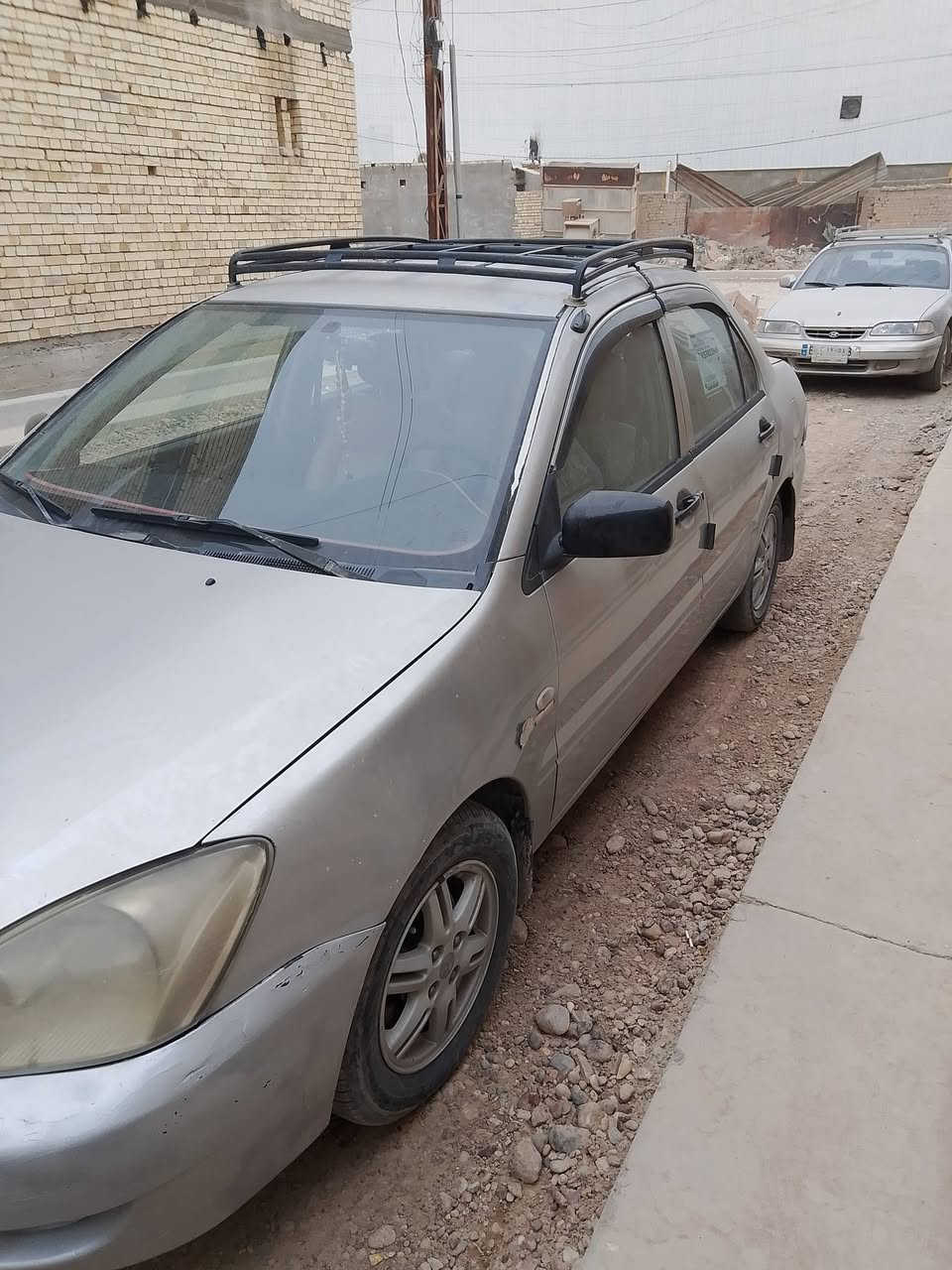 لانسر ٢٠٠٦ • كشنات جلد • بغداد زعفرانيه
