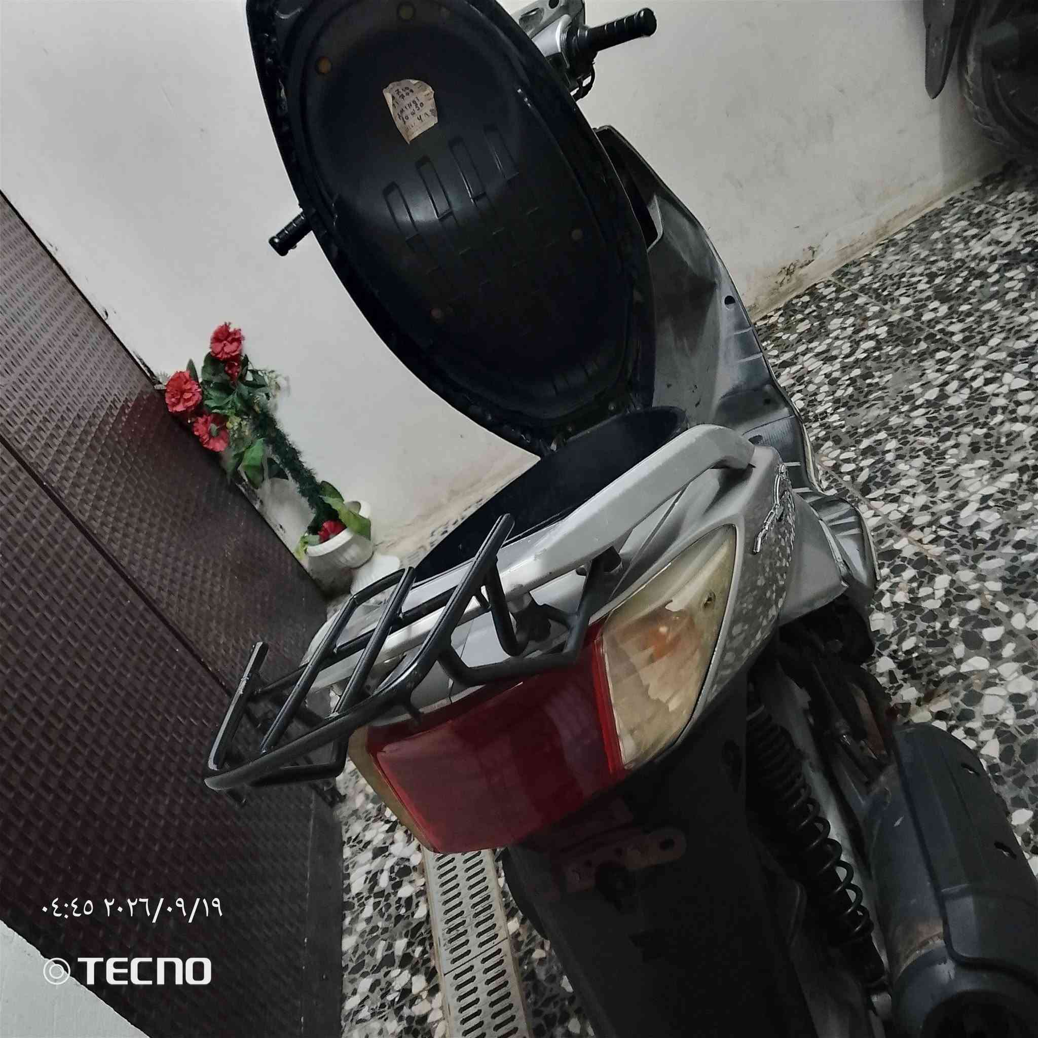 مرخصت صاحب الكروب دراجة سكنس فحل ياباني نوزل خطين دراجة تخبلل احلا من الصورة لون مميز يخبل دراجة بعدة ملحة وسويجات2 كلل نقص مابيها دهن كلة موتل بانزين محسن مال جناي الله شاهد محتاج واريد ابيع الله شاهد تترحملي عليها مكاني مدينه الصدر حبيبية *********** ما متواجد ع فيس

نص مكتوب في الصور:
- ٤:٤٦ ٢٠٢٦/٠٩/١٩ TECNO
- ٠٤:٤٥ ٢٠٢٦/٠٩/١٩
- TECNO
- ٠٤٤٦٢٠٢١٦٩٢٩ TECNO
- ٤:٤٥ ٢٠٢٦/٠٩/١٩ TECNO
- ٠٤:٤٥ ٢٠٢٦/٠٩/١٩ TECNO
- ٠٤:٤٤ ٢٠٢٦/٠٩/١٩ TECNO
- ٠٤:٤٤ ٢٠٢٦/٠٩/١٩ © TECNO