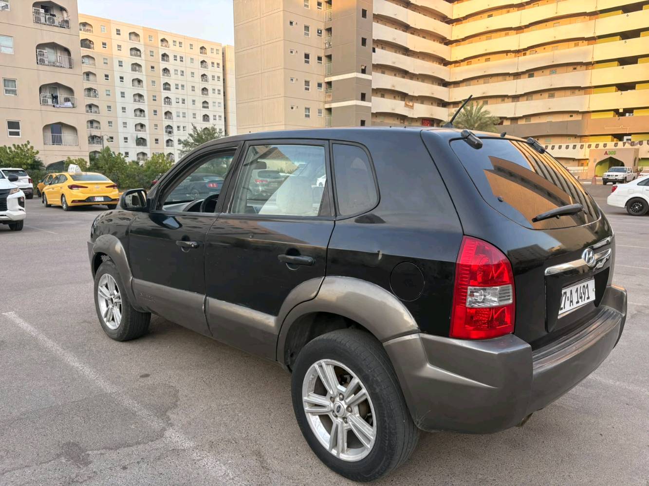 توكسان 2005 رقم ذيقار مشروع وطني انكليزي محرك 6السعر 67