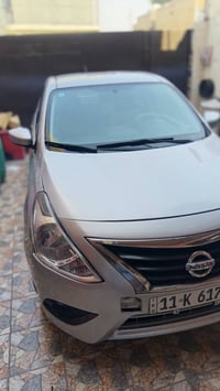 عندي نيسان فيرسا للبيع موديل ٢٠١٩ رقم بغداد جديد باسمي تحويل مباشر سنو...