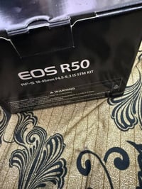 كانون R50 • ٢٤٫٢ ميگابيكسل • أوتوفوكس ممتاز