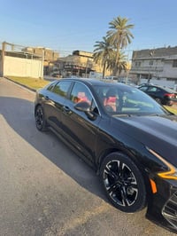 سياره k5موديل2024 ماشيه 60الف ميل ضرر السياره بابين وجاملغ  كما موضح ف...