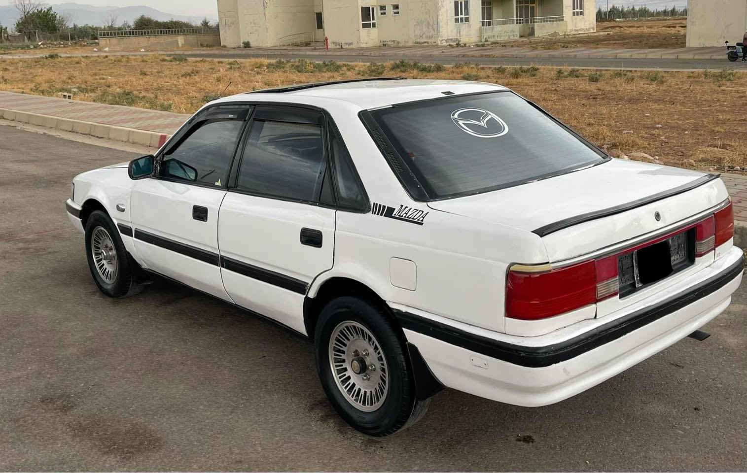 مازدا ١٩٩٠ • جير عادي • بشدار