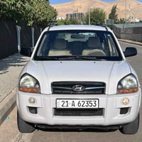 هۆندای توکسۆن ۲٠۱٠ ٠ ڕەنگی سپی ناو زەرد..... ٠ گێڕ ئۆتۆماتیک و عادی......