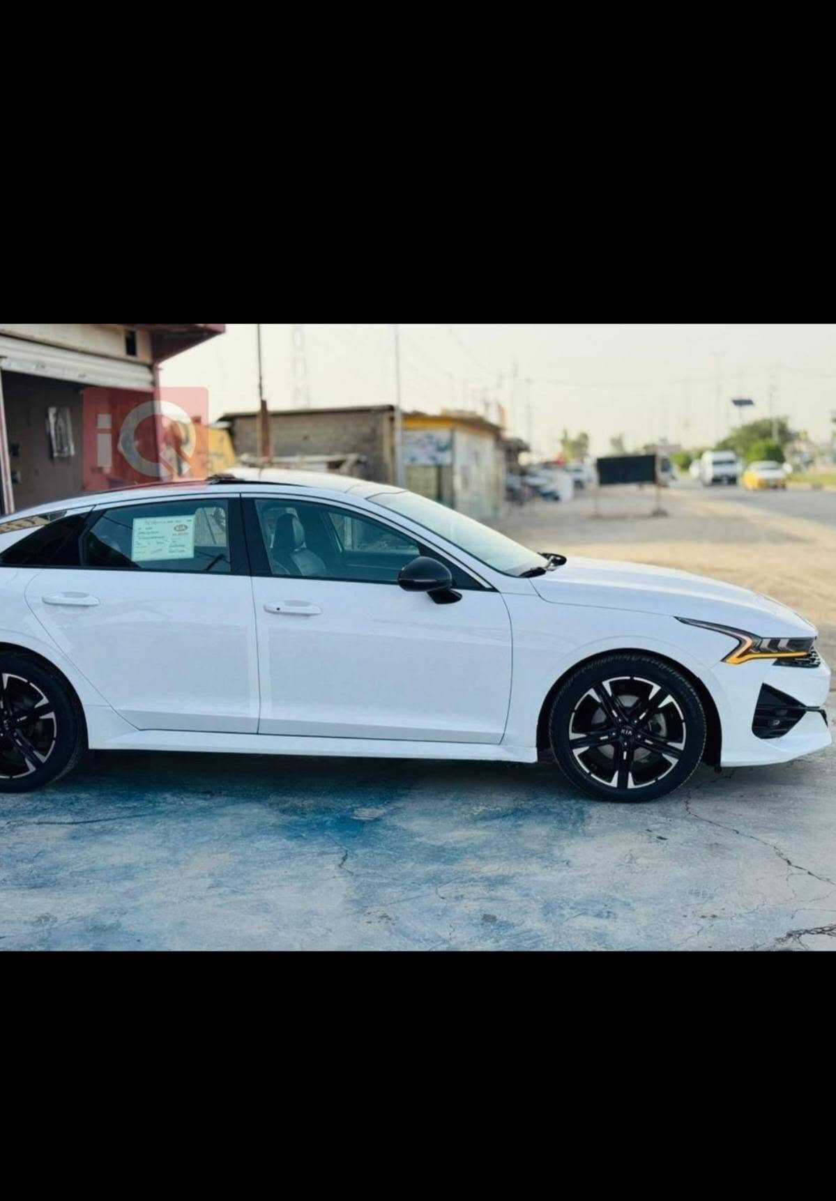 🚗 للبيع
كيا K5 موديل 2021 (أمريكي )
الفئه جيتي لاين فول مواصفات 

للبيع فقط
 كفالة عامة
✔️ ممشى: 75 ميل فقط
✔️ نظافة عالية جداً (قطره معجون مابيه فقط هلال جاملغ امامي مصبوغ )
⚙️ المحرك:
✔️ 4 سلندر
✔️ سعة 1600 تيربو 🛬 
✔️ أداء قوي + صرفية مناسبة
✔️ كير أوتوماتيك
✔️ سقف بانوراما
✔️ بصمة أبواب + تشغيل بصمة
✔️ مقاعد جلد كهرباء
✔️ شاشة كبيرة متصلة
✔️ كاميرا خلفية
✔️ حساسات أمامية وخلفية
✔️ لايت زينون + LED خلفي
✔️ هندبريك بصمة

 شاشة
✔️ Apple CarPlay + Android Auto
✔️ تحكم ستيرن متعدد الوظائف
✔️ مثبت سرعة
✔️ نظام Eco / Sport
✔️ مكيف أوتوماتيك
✔️ مرايا كهرباء مع طي
✔️ شحن USB
✔️ نظام ABS
✔️ مانع انزلاق
✔️ وسائد هوائية
✔️ نظام المحافظة على المسار
✔️ تحذير النقطة العمياء

بسعر مناسب كلش
178

للتفاصيل اكثر الاتصال
***********

نص مكتوب في الصور:
- iQ
- ٧:٣٢ ٤٩٪ iQ BidCars
- ٧:٣١ ٤٩٪ BidCars iQ