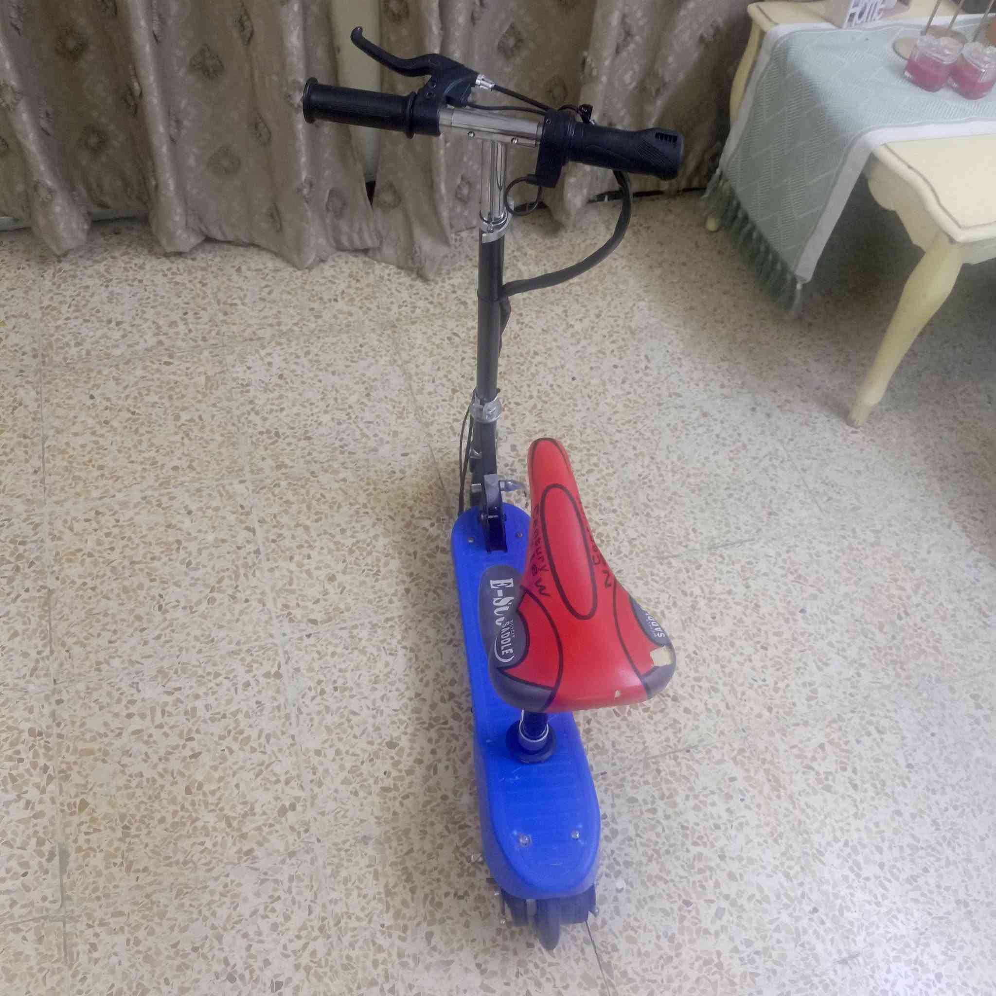 سكوتر شحن • مثل جديد • ديوانية مركز