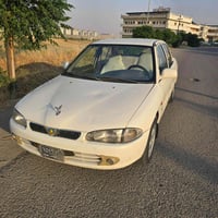 پڕۆتۆن • ٢٠٠٤ • اوتوماتيك