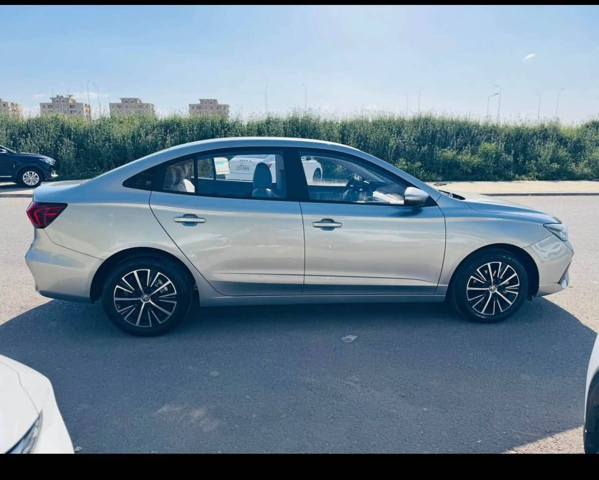 ﷽ 
‏MG 5 comfort 2025  
سەیارەکە شکڵ نوێ یە ئۆکتان 91 بەهیج جۆرێک دیلکۆ لێنایەت پێش و دوا لید لایت لایت زینۆن عەدەسە ویل کڕۆم دەسک بەسمە ئۆتۆ هۆڵد برێک کارەبایی تاعدیل سورعە سوکان ڤۆلیۆم تەبرید مەرکەزی دوو بەسمەی لەگەڵایە سەیارەکە لە سلێمانیە  بەناوی خۆمانەوەیە سەیارەکی زۆر جوان و نازدارە 
ژمارەی خاوەنی:*********** السليمانية, العراق

