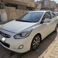 اكسنت • ٢٠١٥ • رقم بغداد
