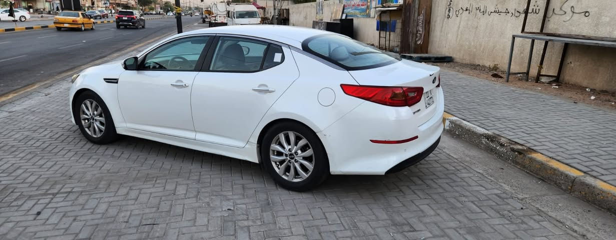 السلام عليكم أوبتما للبيع 2014شكل 2015المجموعه الدوليه معروفه مواصفات الدوليه محرك 2000دوش مكفول من الفتح والتبخير والتنقيص سياره بيها الجاملغالخلفي بالهلال بارد ومصبوغ الجاملغ والباب الخلفيه فقط مفتوح سنترتت براغي موضوح بالسونار بالصور مواصفاتها تبريد قطعتين جلد تحكم ستيرن جهتين فول شاشه كاميرا خلفيه توقف ذاتي يدات نيكل 4دسكات  وباقي المواصفات المعروفه السعر 135 وبيها مجال بسيط مكاني بغداد الرقم ***********
