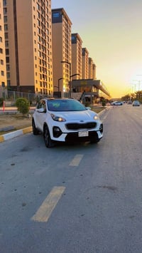 سبورتج لون أبيض  ‏موديل 2019 شكل ال2020 بانوراما  الرقم بغداد  تبريد ق...