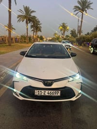 كورلا هايبرد مديل 2024 سيارة نضيفه  رقم بغداد تحويل ثاني يوم وماتصرف ر...