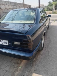 بي ام • موديل ١٩٩٢ • رقم بغداد انكليزي