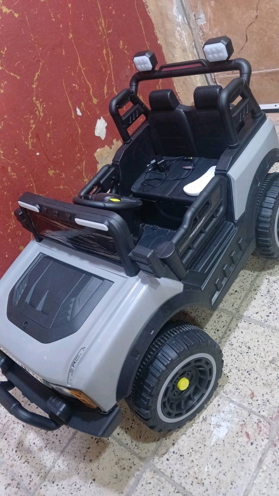 سيارة اطفال ريمونت تحكم وشاحن كلشي شغال بيه السعر ١٢٠ الف  وبيه مجال الرقم ***********