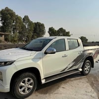ميتسوبيشي ٢٠٢٢ • دبل اكسل • قير اوتوماتيك