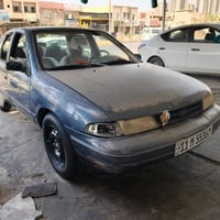 كيا سيفيا موديل 93السيارة بلادية كير اوتوماتيك كهربائيات كلها شغاله تخ...