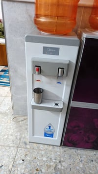 💧 مبرد ماء Midea أصلي مستعمل بحالة ممتازة وكأنه جديد ✨ نظيف ومرتب، وجو...
