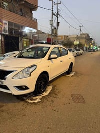 نيسان صني • موديل ٢٤ • رقم بغداد