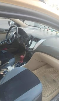 اكسنت للبيع أجره رقم بغداد باسمي وارد أمريكي حادثها جنطه موديل 13 ماشي...