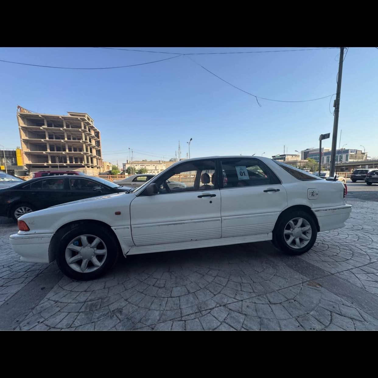🚗 میتسوبیشی گالانتی لۆک بۆ فرۆشتن! 🚗
​ئەگەر بەدوای ئۆتۆمبێلێکی کلاسیکی خاوێن و بێ کێشەدا دەگەڕێیت، ئەمە هەلە!
​✨ تایبەتمەندییەکان:
✅ ڕەنگی سپی بریقەدار، بەدەنه زۆر ساف (تەماشای وێنەی image_2.png بکە).
✅ مەکینە و گێڕ بە شەرت.
✅ خاوەنی سەنڕووف و ویلی جوان.
✅ ژوورەوەی زۆر  خاوێن (تەماشای وێنەی image_4.png بکە بۆ بینینی دیزاینی پێشەوە).
✅ سپۆیلەری پشتەوە بۆ جوانی زیاتر (image_3.png).
​ئەم ئۆتۆمبێلە ئامادەیە بۆ لێخورین و هیچ مەسرەفێکی ناوێت.
​📍 شوێن: [هەولیر]
💰 نرخ: [28 گڵا]
📞 بۆ زانیاری زیاتر: [[***********information]]
گۆرینەوەش ده كه م ئەگەرسه ياره كه م  بەدل  بيت سوران, أربيل
