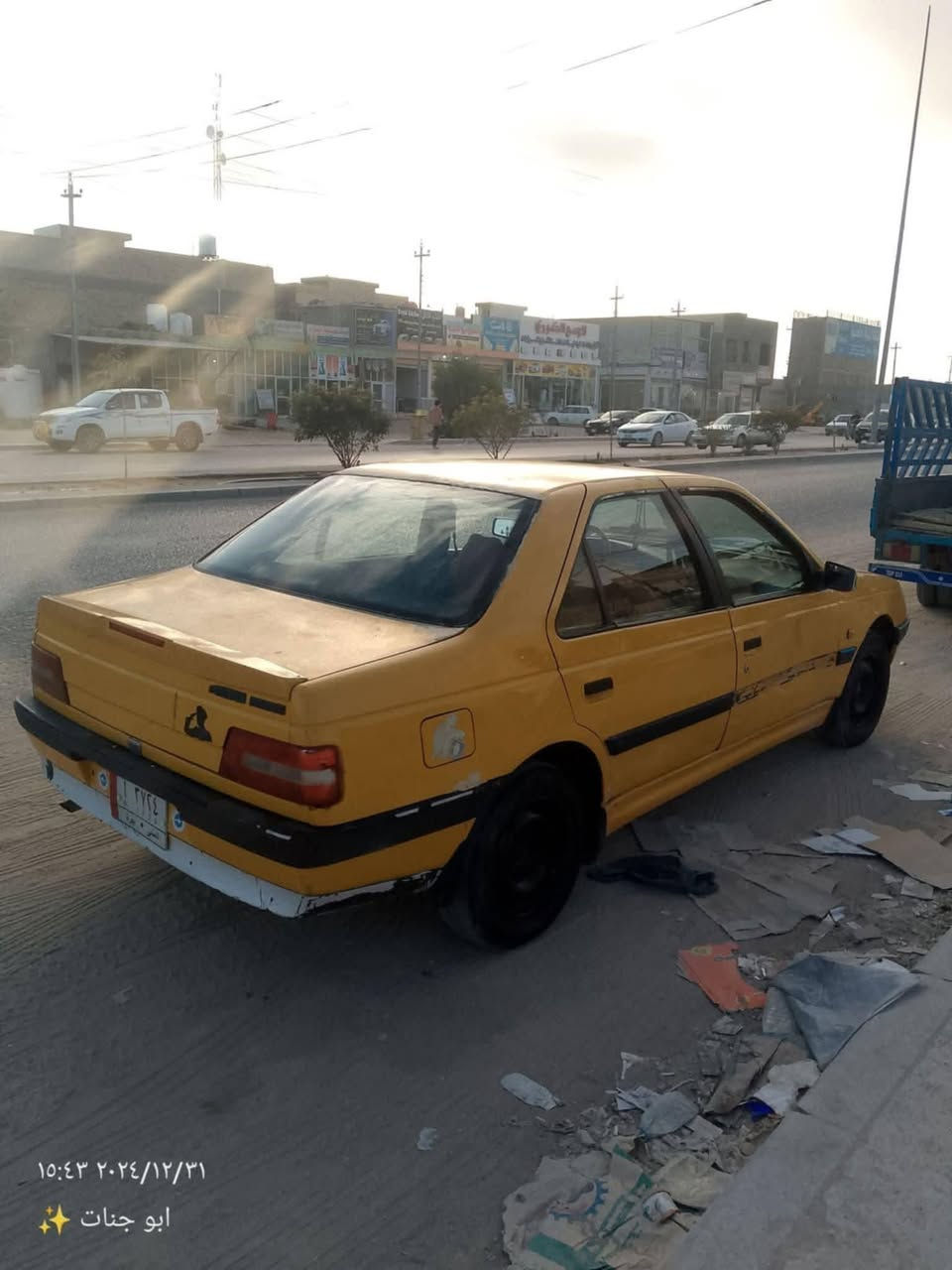 بيجو 405 للبيع الرقم انجليزي  رقم الهاتف  ***********

نص مكتوب في الصور:
- ١٥:٤٣ ٢٠٢٤/١٢/٣١
- ابو جنات
- ✨ ابو جنات ✨