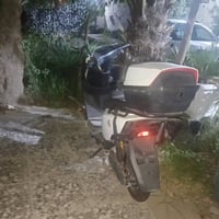 دراجه شحن كلشي شغال بيها بس ناقصها بطاريات السعر خاص 07871476749