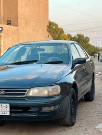 كورولا ٩٣ • محرك وكير شرط • رقم كركوك