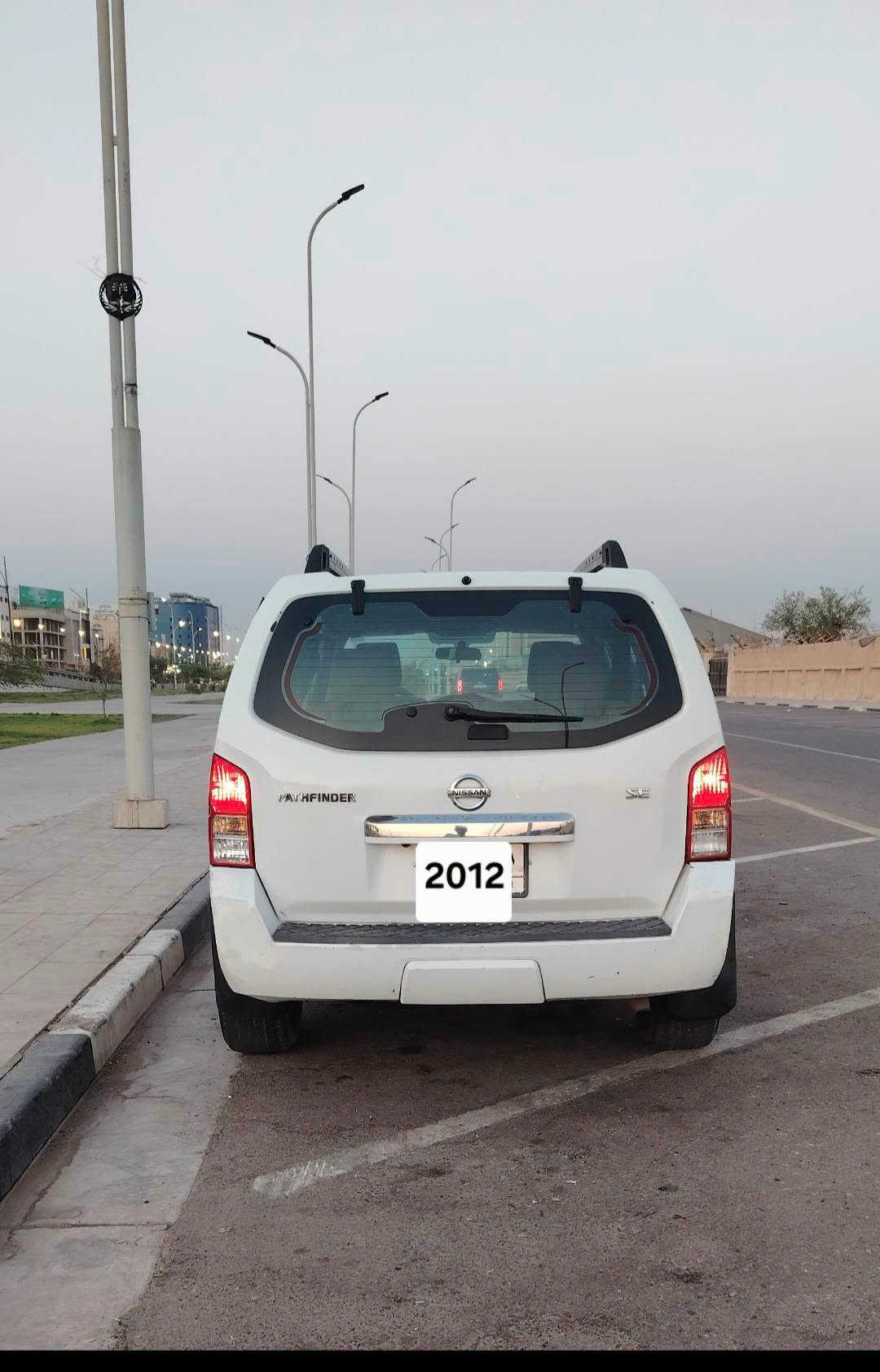 نيسان بافندر مديل 2012 خليجي مكفوله من الضربه والصبغ والشخط  رقم بصره  بسمي تحويل ثاني يوم  محرك مكفول من الفتح  كرير مكفول  تريد ثلج ثلاثة قطع دفع رباعي  فور ويل تحكم استيرن جهتين ديفيدي  سياره نظيفه في معنا الكلمه السعر 140 وبيه مجال قليل أعتذر من المراوس بيع نقد  مكانها البصره  ت***********  بالعافيه على الياخذه لانها سيارتي الخاصه مو مال بياع شراي مال جناي

نص مكتوب في الصور:
- 2012