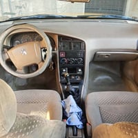 سياره بيجو موديل 2015 كير محرك مكفول رقم بغداد صدر جديد ب اسمي السياره...