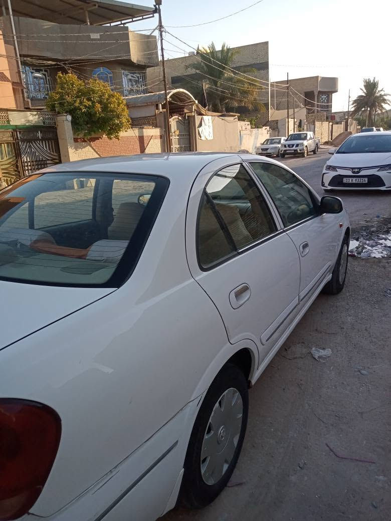 نيسان صني تفاحه ياباني اصل رقم قادسيه دولي بسمي لون ابيض 2006 بيهه دحجه بسيطه بخشم الجاملغ الكدام جهه العبري ومصلحه بارد وبيها دحجه بسيطه شبر جوه يده الباب مال السايق وأيضا بارد مكفوله من داخل كير محرك تبريد المكان نجف للبيع أو مراوس حسب القناعه السعر 85وبي مجال .التواصل خاص او واتساب *********** النجف, العراق
