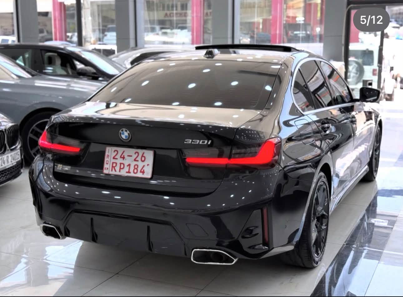 بي ام دبليو 330i 
موديل2025 
حجم محرك 4 سلندر توين توربو
العداد / ماشية 30الف فقط

فول مواصفات
٥ كاميرات 
اوتوپارك
صندوق شفط
تشغيل عن بعد
 فتحه سلايد روف
مري شفط مع اشاير بالمري
 مرايه جانبيه والوسط نوع Auto Dim
لون اسود
 4 ابواب بصمه
ماوس للتحكم
 كشنات اماميه كهرباء هيتر
كاميرا خلفي
 حساسات خلفي و امامي 360 درجة
كشنات جلد
 لايتات عدسة زينون
بك لايت ليد
 داخل 12 لون
حساس مطر اتوماتيك
 رادار مرايا امامي و خلفي
تبريد قطعتين
 مرايا كهربائية
هاند بريك كهربائي Auto hold
 لايت عدسه متحرك مع الستيرن
رادار امامي وخلفي وجانبي ومانع اصطدام توقف ذاتي ، نظام القيادة الذاتية ACC، نظام منع الخروج عن المسار LKA
 نظام النقطة العمياء BSA

 ECO pro نظام
Confort
Sport
sport plus+
الطرر  شبر جملغ ورا PDR

 ايرباك سيستم مرجع 
شركة بشرط الفحص    
   3MW69CW01S8E98997
مكان السياره -دهوك
السعر 310$ بي مجال
***********

نص مكتوب في الصور:
- 2/12
- 3/12
- 4/12
- 5/12