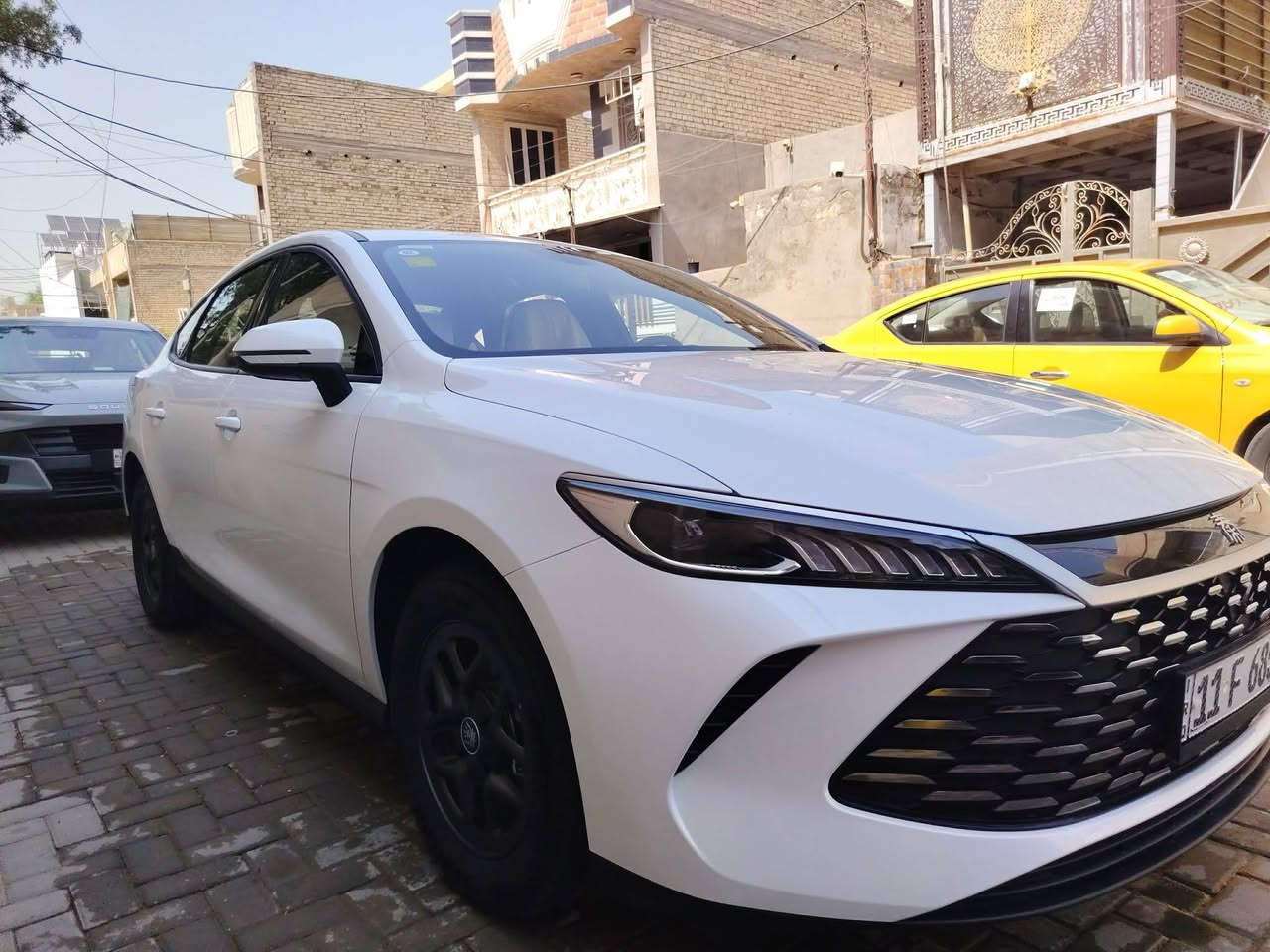 ✅✅بي واي دي  BYD Qin Plus   داخل أبيض
✅✅سنة الصنع 2025  ماشية 2000كم وقابلة للزيادة 
✅✅حجم المحرك 1500cc 
✅✅بطاريه ليثيوم شفرة byd 
سيارة سيدان مدمجة بنظام هايبرد PHEV 
✅✅تجمع بين محرك بنزين هايبرد   بلكن ومحرك كهربائي
✅✅ بطارية ليثيوم شفرةbyd تدعم الشحن السريع
✅✅ شاشة   إنش بنظام ملاحة وتحديثات OTA
✅✅ نظام صوتي بـ6 مكبرات صوت + ميزة الكاريوكي
✅✅ حساسات وكاميرا خلفية – مثبت سرعة – مقاعد جلد 
✅✅ تصميم خارجي عصري بمصابيح LED ومقصورة عازلة للصو
✅✅اوتو ستوب
✅✅حساس خلفي 
✅✅اوتو هولد AUTO HOLD 
✅✅هند بريك بصمه 
✅✅تشغيل السياره بصمه مع
 كارت دخول ذكي
✅✅مقاعد جلد 
✅✅لايت زينون 
✅✅لد نهاري LED
✅✅بك لايتLED
✅✅3انضمة للقيادة 
✅✅مانع تزحلق
✅✅مثبت سرعه  Cruise 
✅✅تشغيل عن بعد 
✅✅شاشة ذكية
✅✅ سعة الخزان 65لتر   اتمشيك 2100 كم
مكاني بغداد الزعفرانية الاتصال واتساب 
***********

نص مكتوب في الصور:
- 12:03 ص
- 12:04 ص