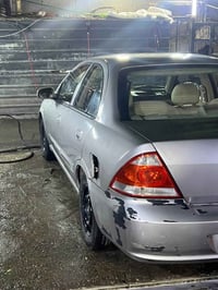 سني ٢٠٠٩  رصاصي   بغداد  كير اوتماتيك  مصبوغه عام   ضربتها من وره خفيف...
