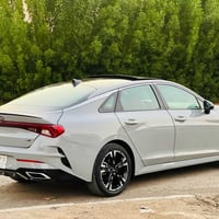🧿 للبيع كيا K5  ماشية (38m)   الفئة جيتي لاين المديل /2021  رقم بغداد ...