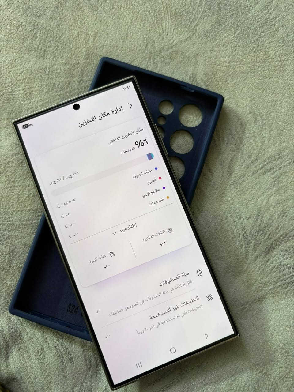 سلام عليكم  S24 الترا ذاكرة 512 جهاز جديد ممبدل بي بس ظهر تفصيخ اصلي السعر 900 مكاني بغداد مستعجل عل بيع بدون ملحقات ***********

نص مكتوب في الصور:
- ١١:٤١
- إدارة مكان التخزين
- مكان التخزين الداخلي
- ٦% المستخدم
- ٢١,١ ج.ب / ٥١٢ ج.ب
- ملفات الصوت
- الصور
- مقاطع فيديو
- المستندات
- إظهار مزيد
- الملفات المتكررة
- ملفات كبيرة
- سلة المحذوفات
- تظل الملفات في سلة المحذوفات في العديد من التطبيقات
- التطبيقات غير المستخدمة
- التطبيقات التي لم تستخدمها في آخر ٣٠ يوماً
- $24
- ١١:٣٩
- حول الهاتف
- Galaxy S24 Ultra
- إعادة تسمية
- SM-S928B/DS
- RFCX807JT4P
- 355731678215345
- 357846948215343
- اسم المنتج
- اسم الطراز
- الرقم التسلسلي
- SIM المتاحة ١
- IMEI ١
- SIM المتاحة ٢
- IMEI ٢
- معلومات الحالة
- معلومات قانونية
- معلومات البرنامج
- معلومات البطارية