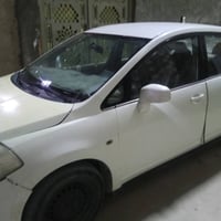 نيسان تيدا • نظيفة • قير ومكينة مكفول