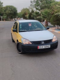 لانسر ٢٠١٠ • محرك ٢٠٠٠ • بدون ضربه