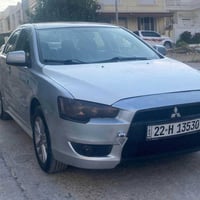لانسر ٢٠٠٨ • ماتور يسرف زيت • اربيل