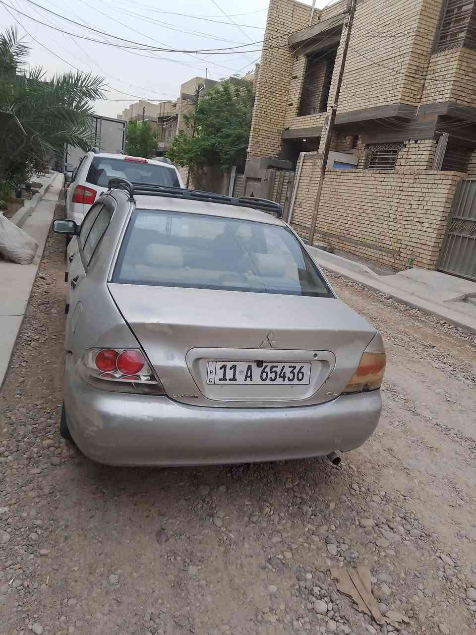 لانسر ٢٠٠٦ • كشنات جلد • بغداد زعفرانيه