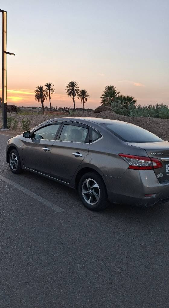 نيسان سنترا خليجي 2016 رقم بغداد دولي بأسمي 
< كير . محرك . تبريد . صدر . نضيفات > 
محرك 1600 .
قطعتين تبريد . 
شاشه + كامره 
السونار بالصور . صبغ بنيد . وبيها ملاحظات بالكشر بدون اي دواخل ↗️
السعر 89 وبيها مجال بسيط .
مكان السياره بغداد العامريه 
للاستفسار ( *********** ) بغداد, العراق

نص مكتوب في الصور:
- *********** *********** العنوان : بغداد - البياع - تقاطع درويش - مقابل المجمع السكني تاريخ الفحص 25-09-2026 الوقت 12:05:13 PM اسم صاحب السيارة رقم السيارة النوع والموديل نيسان سنترا/رصاصي2016 ملاحظة : الفحص نافذ لمدة 3 ايام من تاريخ الفحص الجانب الايمن بارد ومفتوح جاملغ امامي - بارد ومعجون وتكحيل كارت باب امامي - بارد وتكحيل كارت باب خلفي - بارد جاملغ خلفي - ضرر دوسه - رصعات وخدوش في الجانب المصد الخلفي رصعات وخدوش قبق الجنطة - خدوش ومفتوحة دعامية الجانب الايسر بارد ومفتوح باب أمامي - رصعات وخدوش في الجانب - طخه تكمة المصد الامامي صبغ ومفتوح بنيد - صبغ ومفتوحة دعامية الجزء العلوي رصعات وخدوش قمارة
