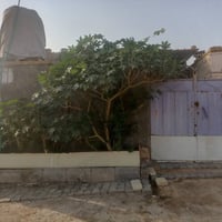 بيت للبيع • ١٠٠م • خلف جامعة كربلاء